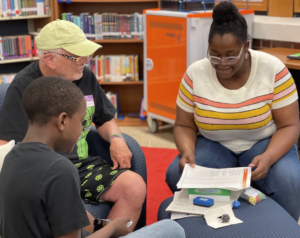 Seeds 4 Success Participant, Staff, and Volunteer at Tutoring.